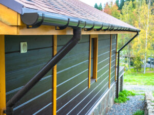 Holder gutter drainage system on the roof. Drain on the roof of